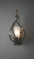 Taureanlace forged iron wall sconce with frosted pillar candle glass